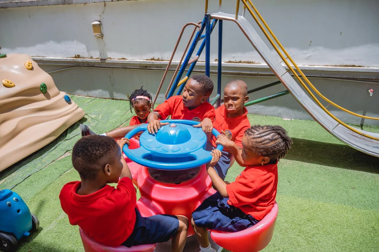 Group of Tenderville children playing together
